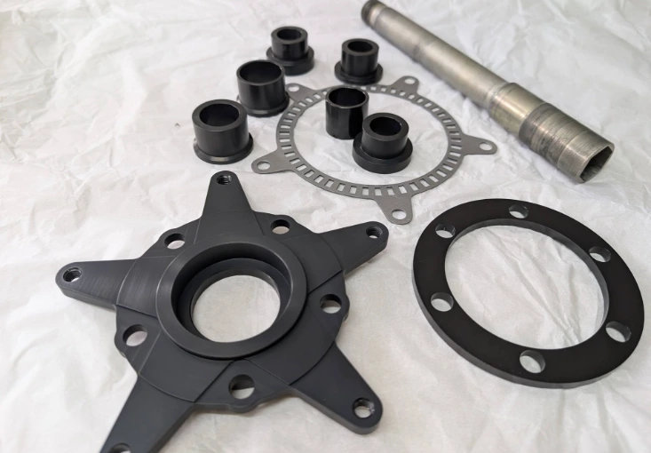 Machined parts for PVM 10Y wheelset in a Husqvarna Nuda